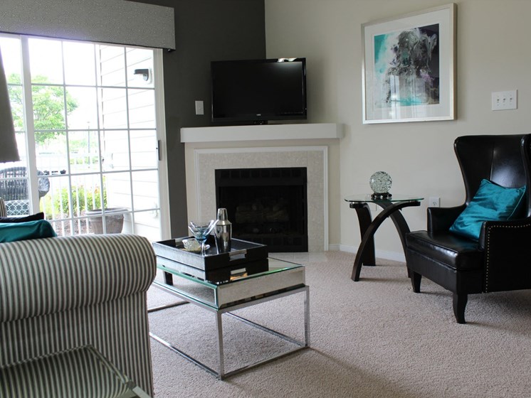 Living Room With Standard Fireplace at Abberly Twin Hickory Apartment Homes by HHHunt, Glen Allen, Virginia